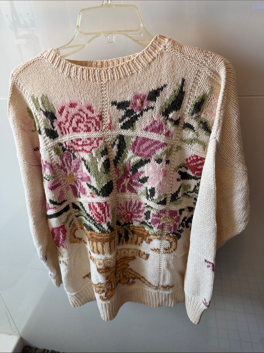 Beautiful long sleeve cotton sweater with
Flowers and vase pattern.